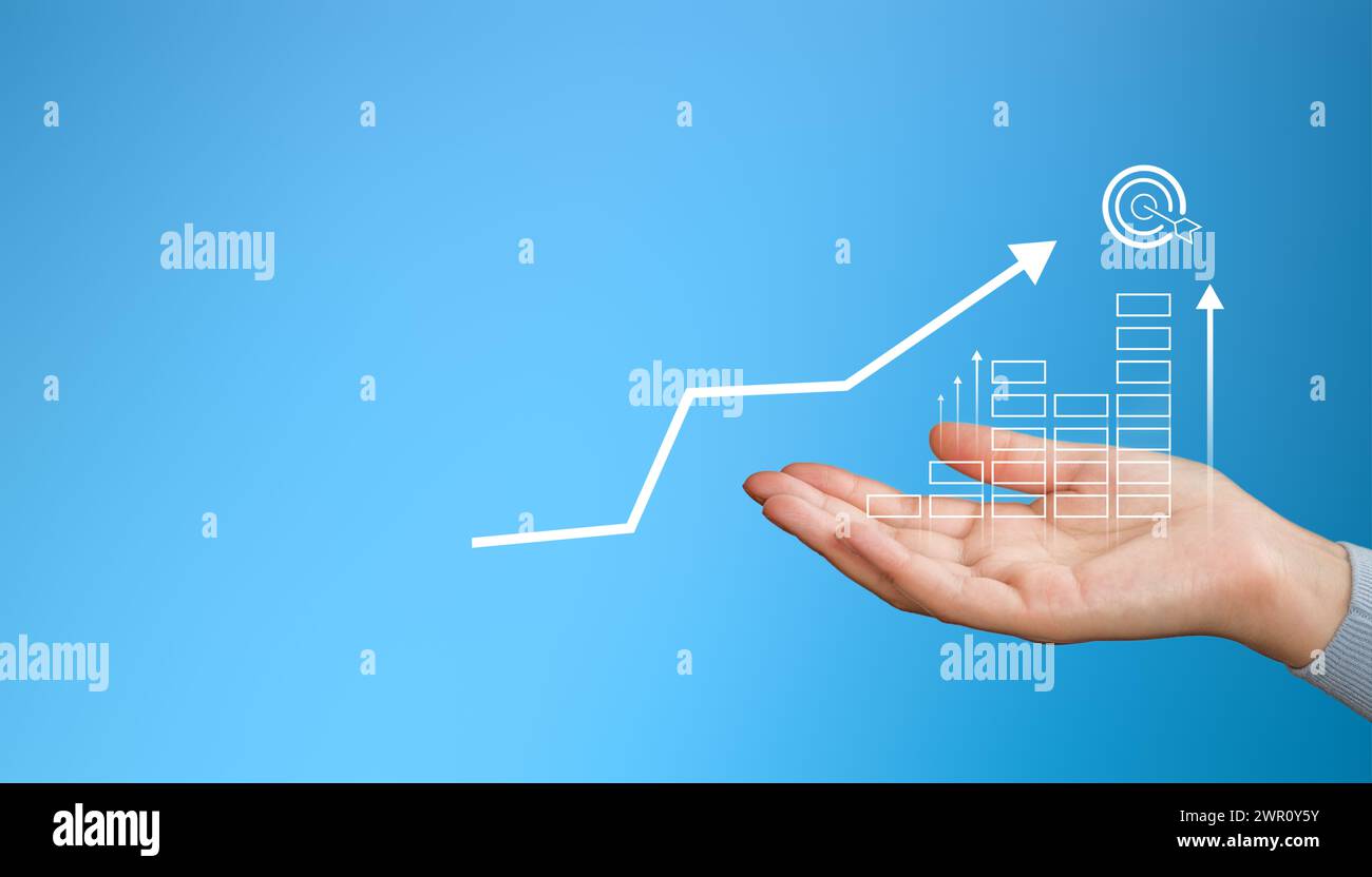 Uomo d'affari con un grafico in crescita. Crescita del business e risultati dei profitti. Concetto di soddisfazione del cliente Foto Stock