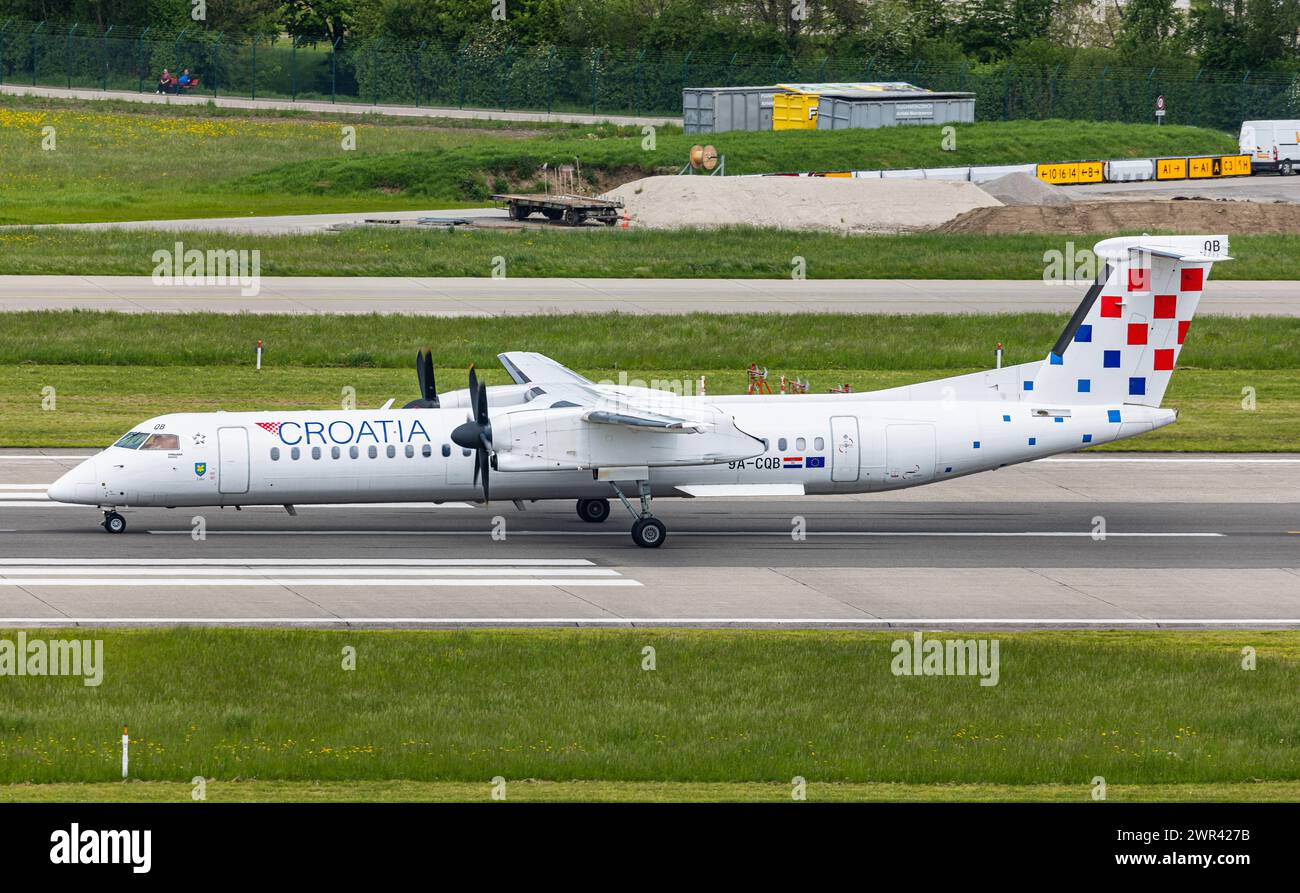 Eine Bombardier Dash 8 Q400 von Croatia Airlines startet von Startbahn 28 des Flughafen Zürich. Registrazione 9A-CQB. (Zürich, Svizzera, 07.05.2023) Foto Stock