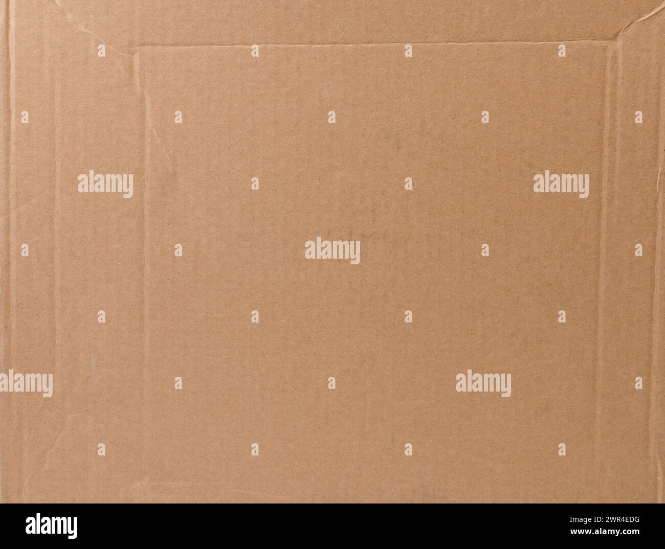 Pagina di carta riciclata di colore beige con linea di piegatura a strisce Foto Stock