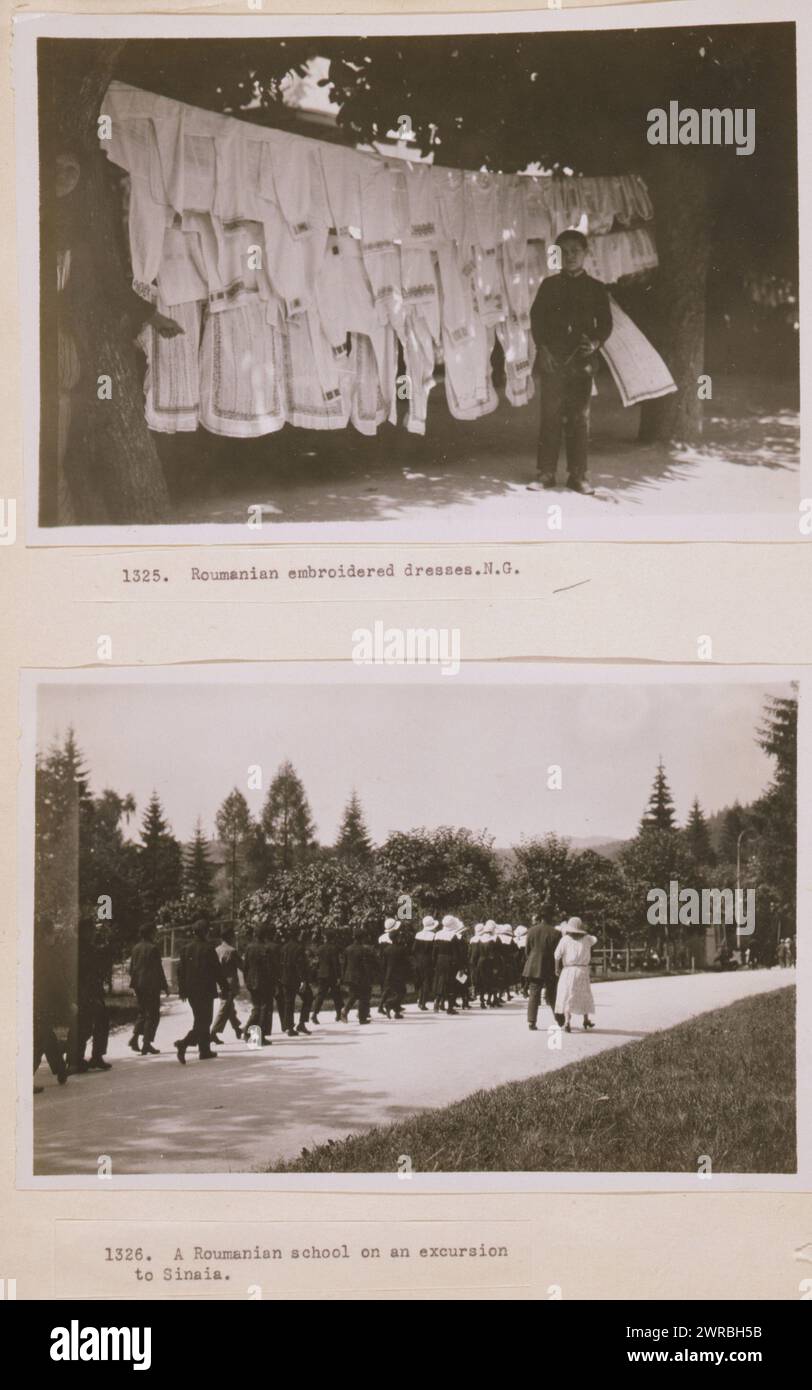 Abiti ricamati romaniani, N.G. A Roumanian School in un'escursione a Sinaia., le fotografie mostrano scene in Romania tra cui un ragazzo in piedi davanti a abiti appesi alle linee e un gruppo di scolari che camminano lungo una strada., Carpenter, Frank G. (Frank George), 1855-1924, fotografo, 1923., abiti, Romania, 1920-1930, stampe in argento gelatina, 1920-1930., stampe in argento gelatina, 1920-1930, 2 stampe fotografiche (1 pagina): gelatina argento Foto Stock