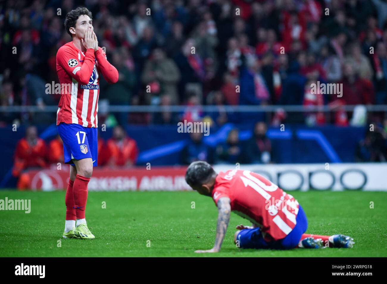 Madrid, Spagna. 13 marzo 2024. Rodrigo Riquelme (L) dell'Atletico Madrid reagisce durante il turno di UEFA Champions League del 16° turno di andata e ritorno tra l'Atletico Madrid e l'Inter Milan a Madrid, Spagna, 13 marzo 2024. Crediti: Gustavo Valiente/Xinhua/Alamy Live News Foto Stock