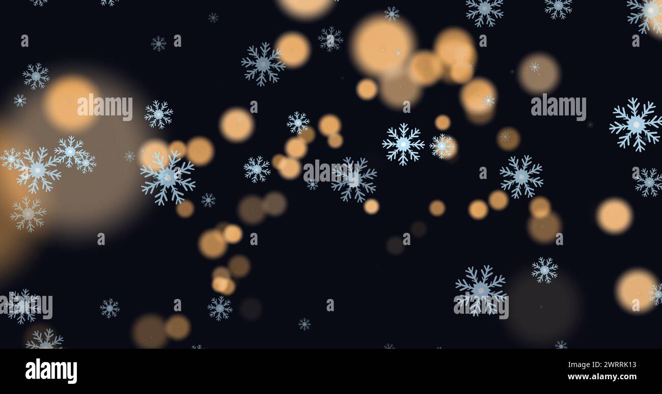 Immagine di fiocchi di neve su macchie chiare su sfondo nero Foto Stock