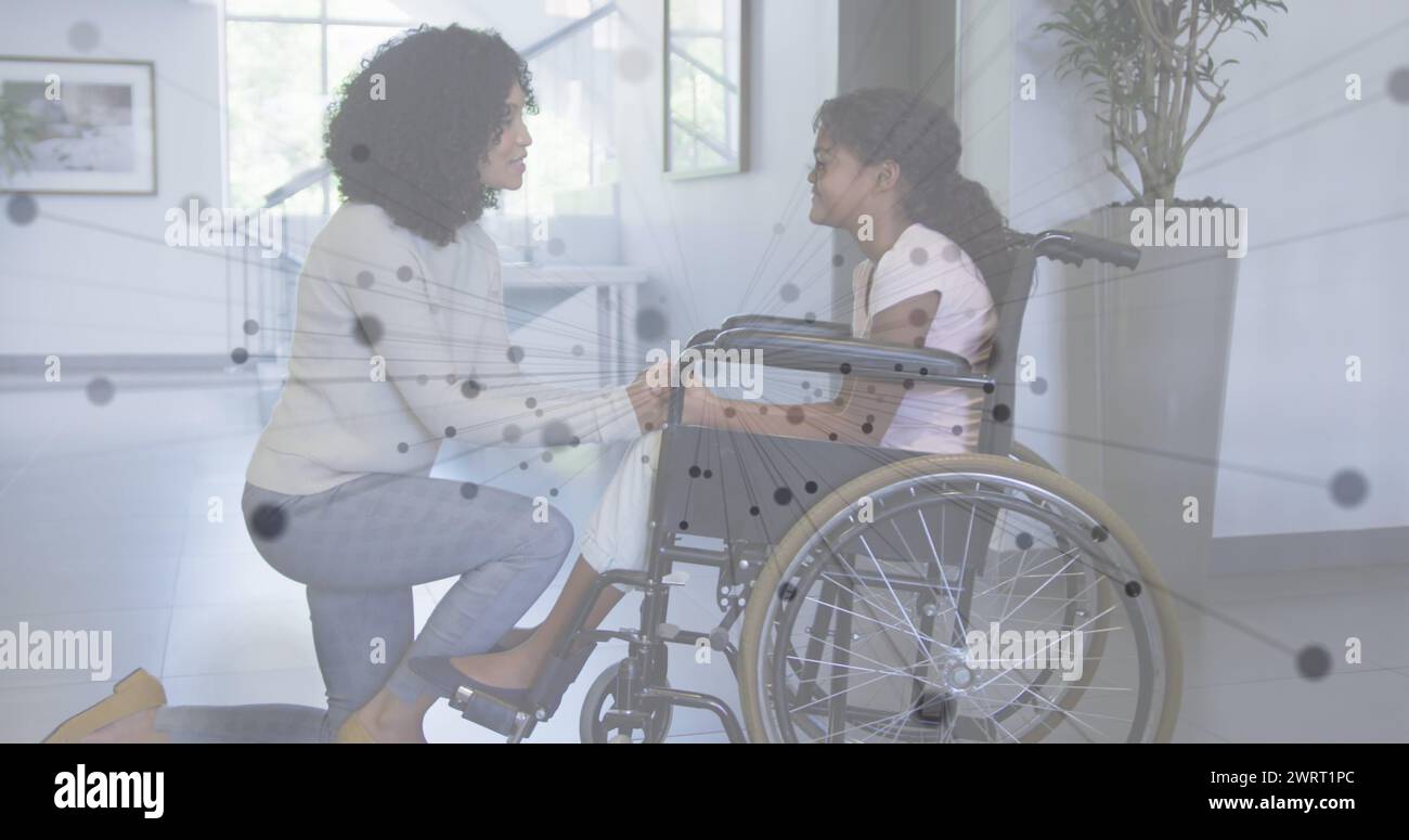 Immagine di una rete di collegamenti su madre e figlia afroamericane in sedia a rotelle Foto Stock