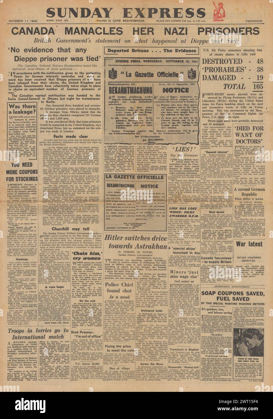 1942 la prima pagina di Sunday Express riporta le manacoli canadesi prigionieri di guerra tedeschi Foto Stock