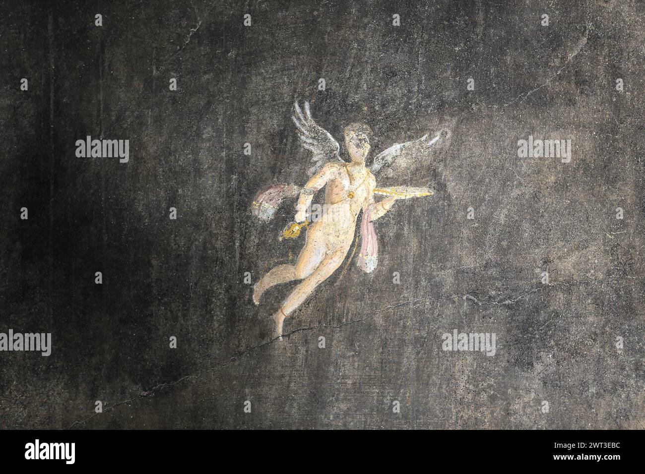 Un dettaglio di uno degli affreschi nella restaurata casa del frutteto, situata negli scavi archeologici di Pompei. Foto Stock