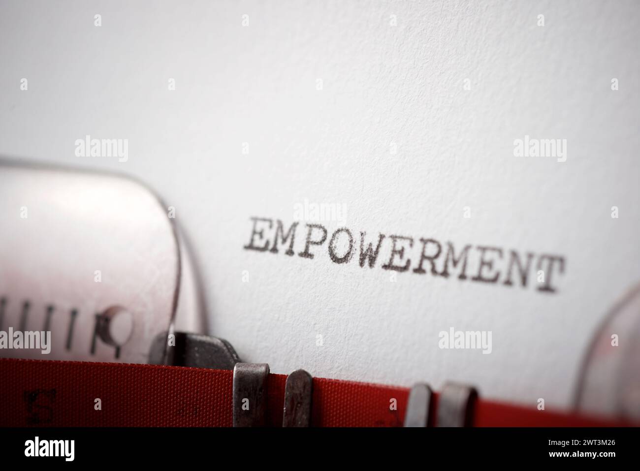 Parola di empowerment scritta con una macchina da scrivere. Foto Stock
