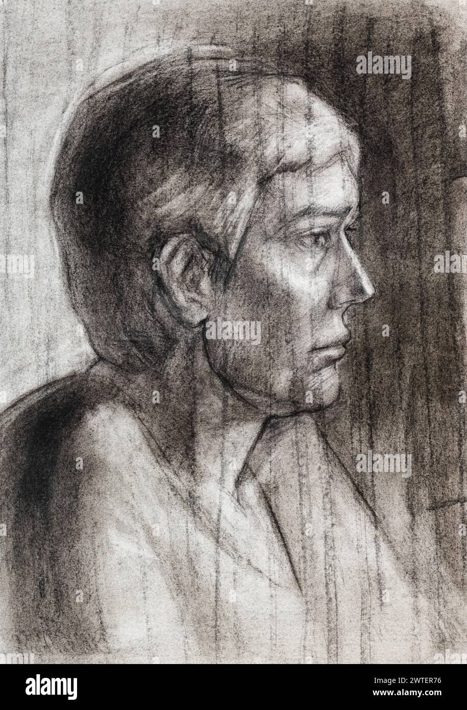 Studiare il ritratto dell'uomo disegnato a mano da carbone su carta bianca Foto Stock