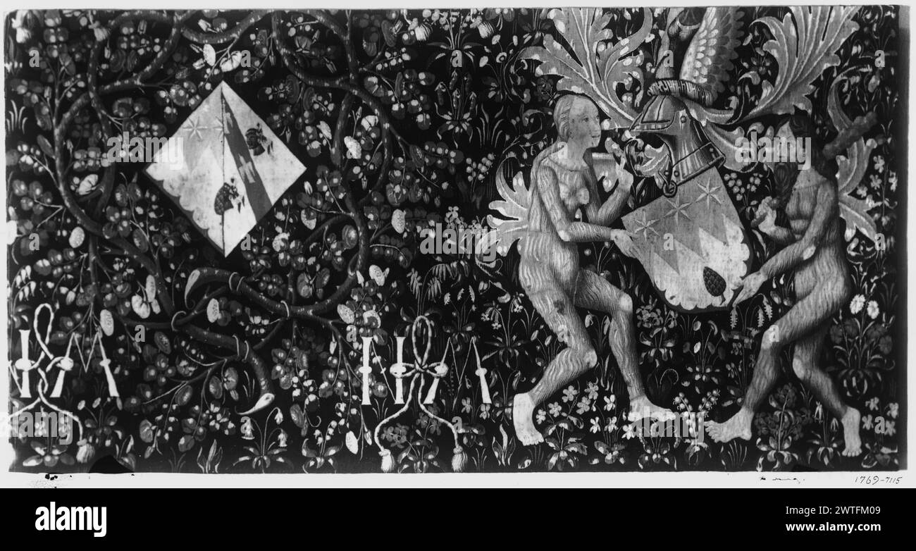 I millefleurs dell'armeria con l'uomo e la donna selvaggi. Sconosciuto c. 1460 arazzi dimensioni: H 3'9' x W 3'8' (lato sinistro, stemma) arazzi materiali/tecniche: Lana (ondulata, ordito: 6-7/cm); lana e seta: (Tinta, trama) Cultura: Paesi Bassi meridionali storia di proprietà: Charles T. Barney Coll., New York. French & Co. Ha acquistato da Barney Estate 11/1/1916 [stesse informazioni sulle SS 7115/49-50 e 7115/49-51]. French & Co. Venduto al Museum of fine Arts 5/15/1952 [questa informazione proveniva da Cavallo Cat.]. Stati Uniti, Massachusetts, Boston, Museum of fine Arts, accno. 52.478. Iscrizioni: Legate a nastro Foto Stock