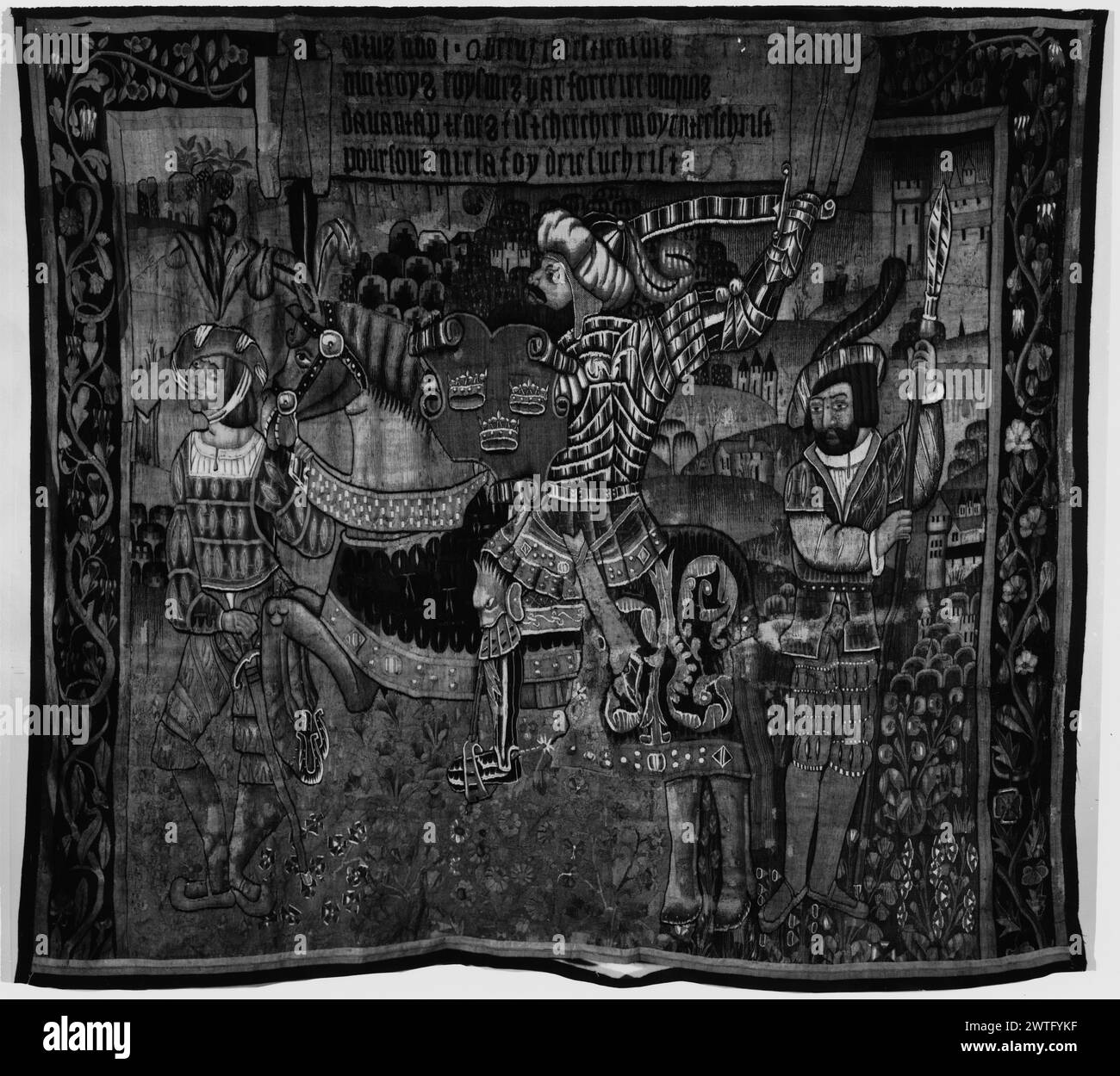 Re Artù. Sconosciuto c. 1520-1540 arazzi dimensioni: H 10' x W 11'5' arazzo materiali/tecniche: Sconosciuto Cultura: Sud dei Paesi Bassi tessitura Centro: Sconosciuto storia di proprietà: French & Co. Acquistato da Bacri Frères 4/10/1918. Iscrizioni: Iscrizione in banderole francese del confine superiore uomo in armatura con turbante, montato su cavallo anche in armatura, steward e spearman si trovano accanto al cavallo (L, UPR e R BRD) che torce viti con fiori; (UPR BRD) banderolo centrale con iscrizione No French & Co. foglio di magazzino in archivio, no numero di stock Hunter, Practical book of Tapestries (1925), PL. XVIII a, A. Foto Stock