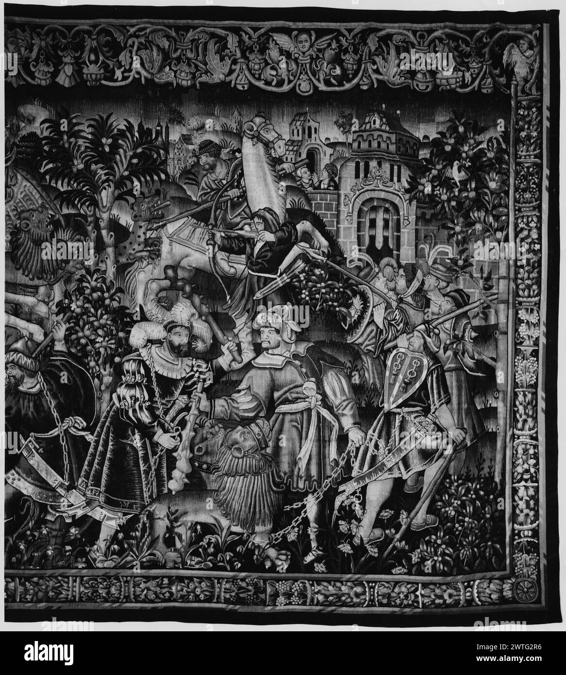 Caccia ai leoni. Grenier, Jean (olandese (prima del 1600) - Fiandre, atto 1497-1513) (workshop, attr.) [tessitore] Poissonier, Arnould (olandese (prima del 1600) - Fiandre, atto 1491-d.1522) (laboratorio, attr.) [tessitore] c. 1500-1510 arazzi dimensioni: H 12'8' x W 22'4' arazzi materiali/tecniche: Sconosciuta Cultura: Paesi Bassi meridionali storia di proprietà: Le Comte Louis de Dreux Brezé coll. J. P. Morgan coll. French & Co. (Circa 1961). Jack Benardout Coll., Londra. Coll. Privato, Sao Paolo. Stati Uniti, New York, New York, Sotheby's, 23 novembre, 1987, lotto 495. Nel paesaggio, cacciatori a cavallo e f Foto Stock