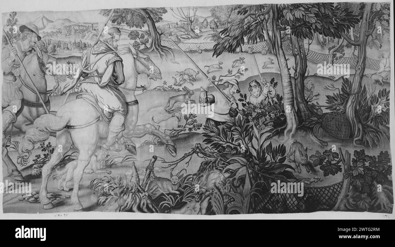 Caccia al coniglio. Sconosciuto c. 1650 arazzi dimensioni: H 7'9' x W 14'7' arazzo materiali/tecniche: Sconosciuto Cultura: Fiammingo tessitura Centro: Sconosciuto storia di proprietà: French & Co. Acquistato da James Deering 9/6/1916. Nel paesaggio, 2 cacciatori a cavallo accompagnati da cacciatori a piedi, inseguono conigli con cani da caccia, reti e lance che mancano. Arazzo eseguito nello stile di circa 1550. French & Co. Foglio di magazzino in archivio, 3676-b opere correlate: Pannelli in serie: GCPA 0241575-0241576 Foto Stock