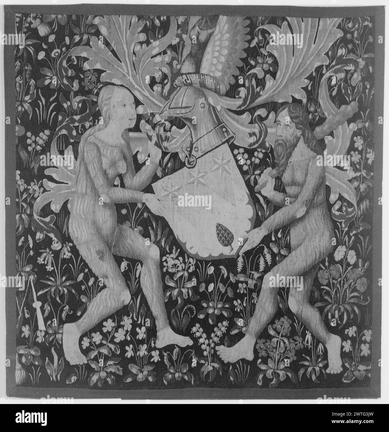 I millefleurs dell'armeria con l'uomo e la donna selvaggi. Sconosciuto c. 1460 arazzi dimensioni: H 3'9' x W 3'8' (lato sinistro, stemma) arazzi materiali/tecniche: Lana (ondulata, ordito: 6-7/cm); lana e seta: (Tinta, trama) Cultura: Paesi Bassi meridionali storia di proprietà: Charles T. Barney Coll., New York. French & Co. Ha acquistato da Barney Estate 11/1/1916 [stesse informazioni sulle SS 7115/49-50 e 7115/49-51]. French & Co. Venduto al Museum of fine Arts 5/15/1952 [questa informazione proveniva da Cavallo Cat.]. Stati Uniti, Massachusetts, Boston, Museum of fine Arts, accno. 52.478. Iscrizioni: Legate a nastro Foto Stock