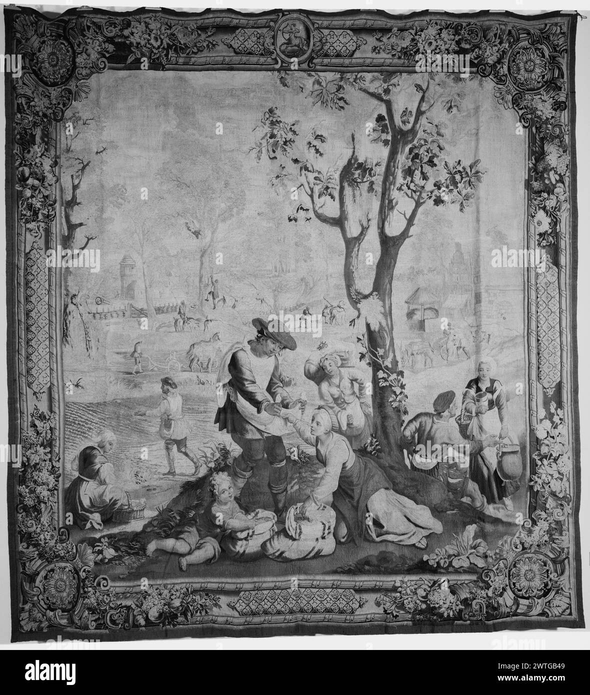 Novembre. Master of the Months of Lucas (Netherlandish (before 1600), 1535) (autore del design) [Painter] 1731-1743 arazzi dimensioni: H 11'7' x W 9'8' arazzo materiali/tecniche: Cultura sconosciuta: French Weaving Center: Paris Ownership History: Lord Winborne coll., Winborne Castle. Marchese da Foz coll., Lisbona. Peter A. B. Widener & Joseph E. Widener coll., Lynnewood Hall, Elkins Park Pennsylvania; venduto a Samuel T. Freeman (Philadelphia), 21/6/1944, lotto 489. French & Co. Ha acquistato da Jack Linsky 6/20/1944 [o 6/21/1944?]; venduto a Mr. Robert Mikaeloff 21/7/1966. Uomini e donne della fattoria si preparano Foto Stock