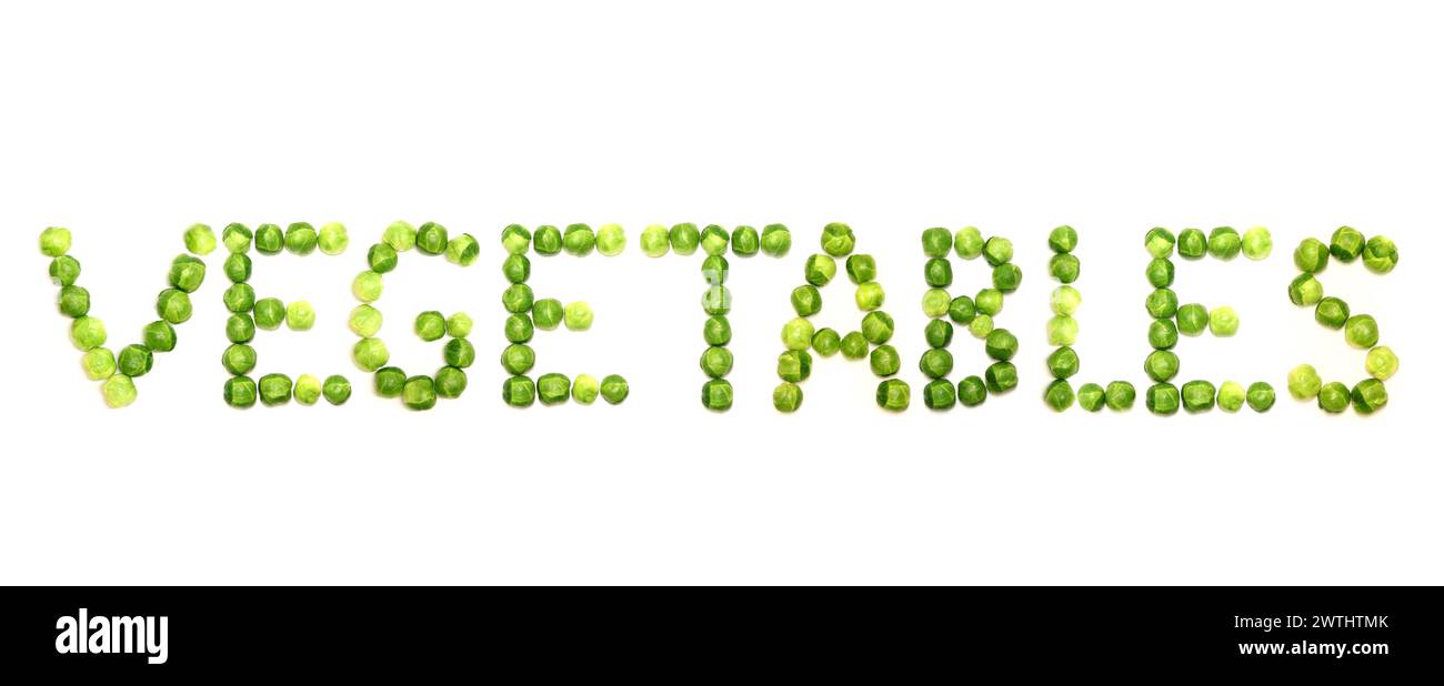 La parola verdure è scritto con cavoletti di bruxelles su un'immagine bianca e potrebbe essere usato per ottenere attraverso il messaggio di mangiare sano, in particolare di avidità Foto Stock