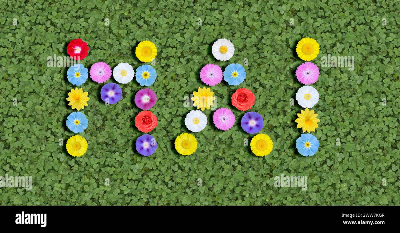 Mese di maggio scritto con teste di fiori Foto Stock