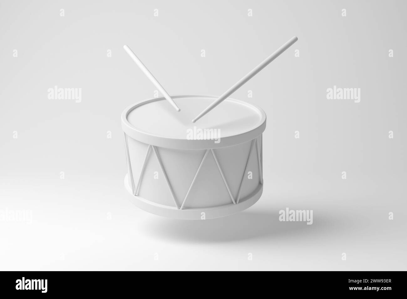 Tamburo bianco con un paio di bacchette galleggianti a mezz'aria su sfondo bianco. Orchestre, sfilate di eventi speciali e concerti Foto Stock