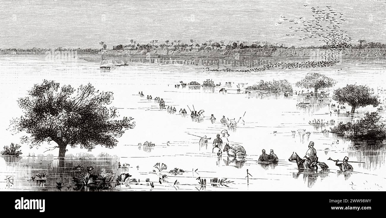 Villaggio di Logone-Birni, sponda del fiume Logone. Confine di Stato tra Camerun e Ciad. Africa centrale. Disegno di Ivan Pranishnikoff (1841 - 1909) viaggio da Borno a Baguirmi 1872 del Dr. Gustav Hermann Nachtigal (1834 - 1885) le Tour du Monde 1880 Foto Stock