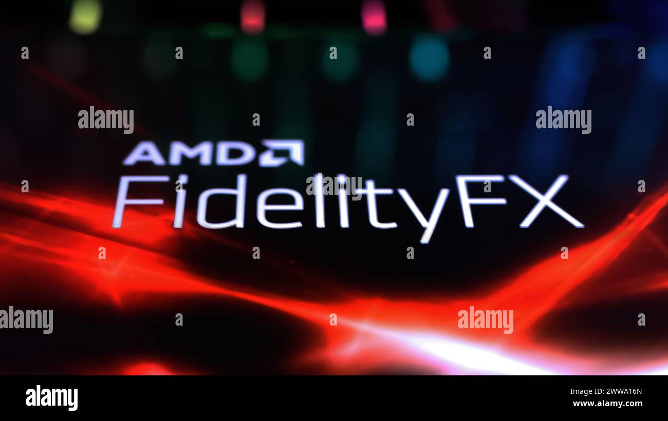 Viersen, Germania - 9 marzo. 2024: Primo piano dello smartphone con logo AMD FidelityFX sulla tastiera del computer Foto Stock