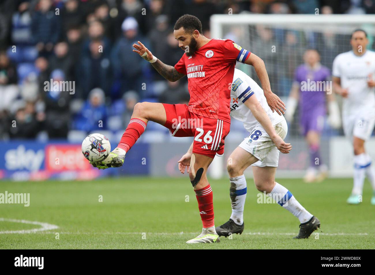 Birkenhead, Regno Unito. 23 marzo 2024. Jay Williams di Crawley Town passa il pallone. EFL Skybet Football League Two Match, Tranmere Rovers contro Crawley Town a Prenton Park, Birkenhead, Wirral sabato 23 marzo 2024. Questa immagine può essere utilizzata solo per scopi editoriali. Solo per uso editoriale, .pic di Chris Stading/ credito: Andrew Orchard fotografia sportiva/Alamy Live News Foto Stock