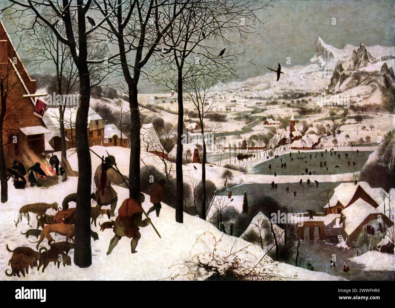 "I cacciatori nella neve" di Pieter Brueghel il Vecchio (1565 circa): Situato nel Kunsthistorisches Museum di Vienna, questo dipinto è un'opera chiave del Rinascimento, che illustra il passaggio verso paesaggi dettagliati e scene di genere. Come parte della serie di Brueghel sulle stagioni, ritrae vividamente la vita invernale, mescolando l'attività umana a un vasto ambiente naturale. Foto Stock