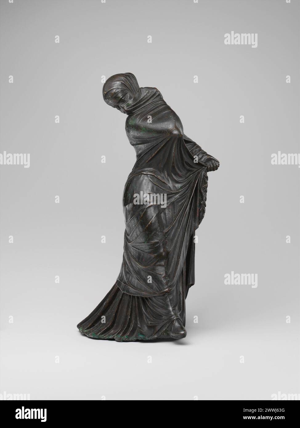 Statuetta in bronzo di una ballerina velata e mascherata periodo greco: Ellenistica III-II secolo a.C. Foto Stock