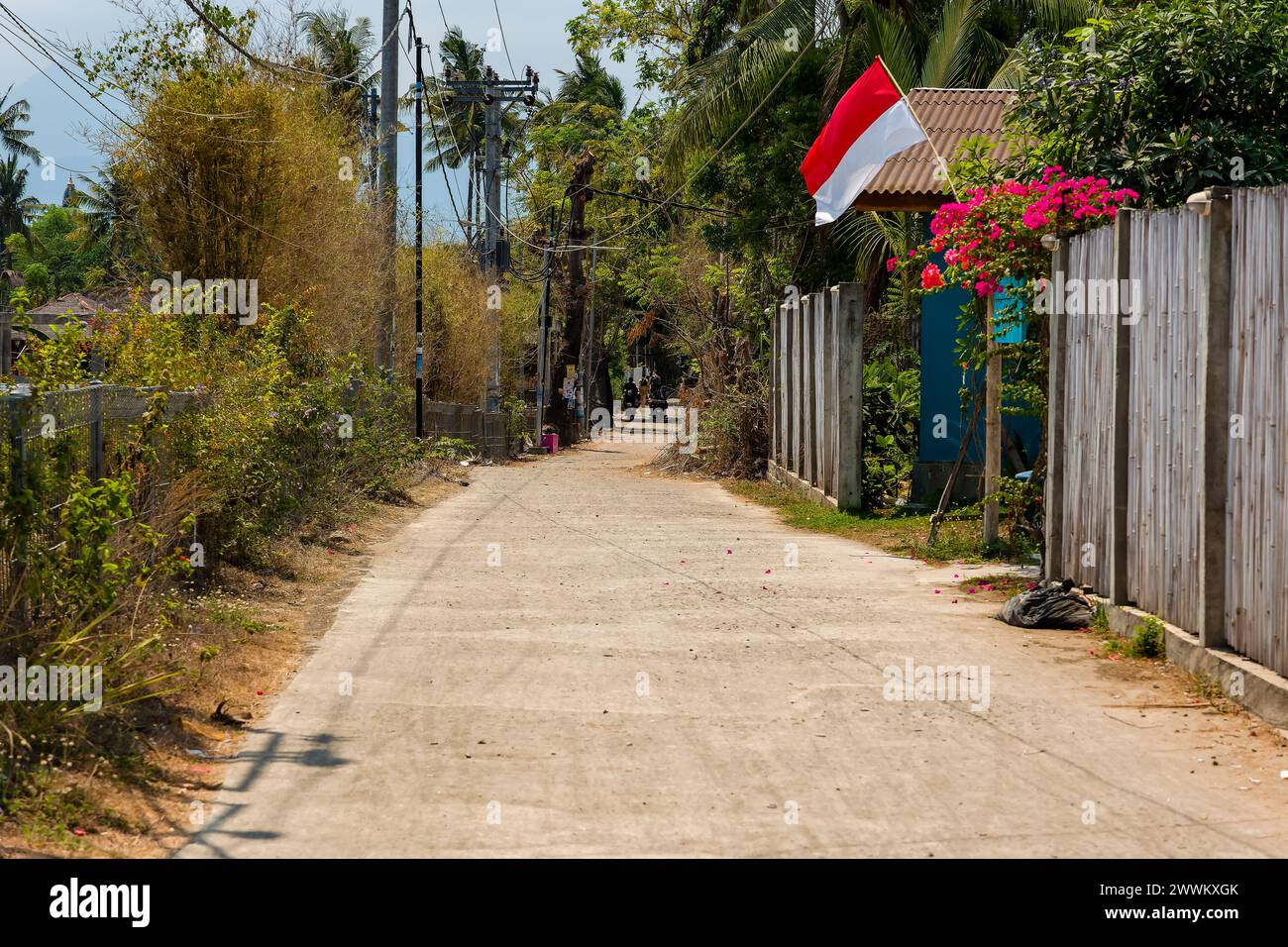 Tranquille strade sterrate sulla piccola isola turistica di Gili Air vicino a Lombok, Indonesia Foto Stock