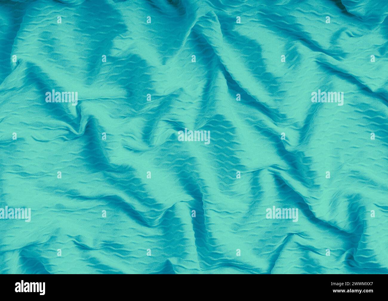 Vista ravvicinata con motivo in tessuto verde, sfondo del materiale tessile Foto Stock