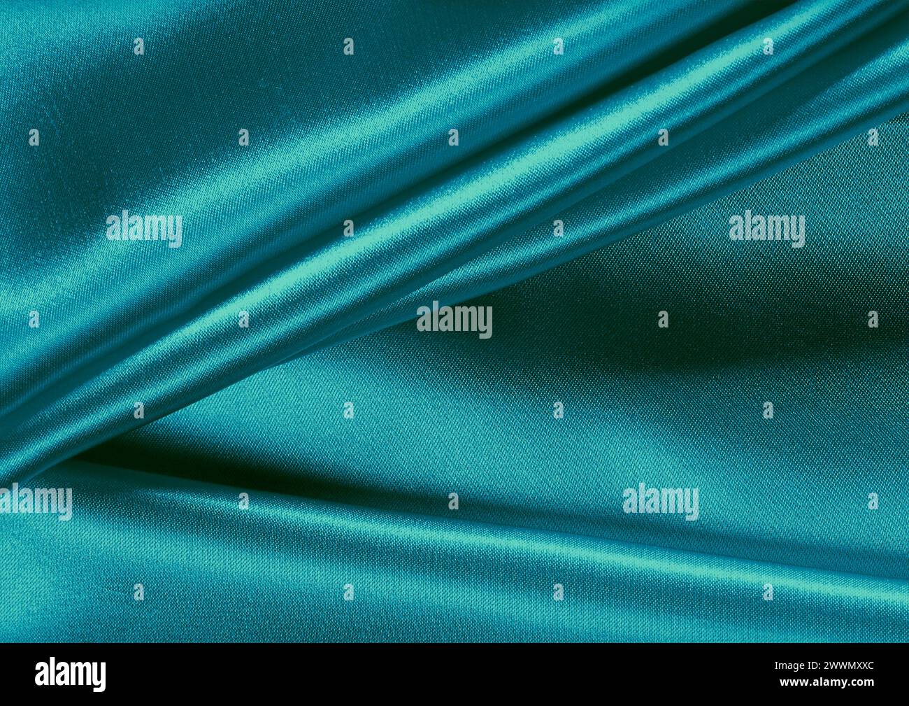 Vista ravvicinata con motivo in tessuto verde, sfondo del materiale tessile Foto Stock