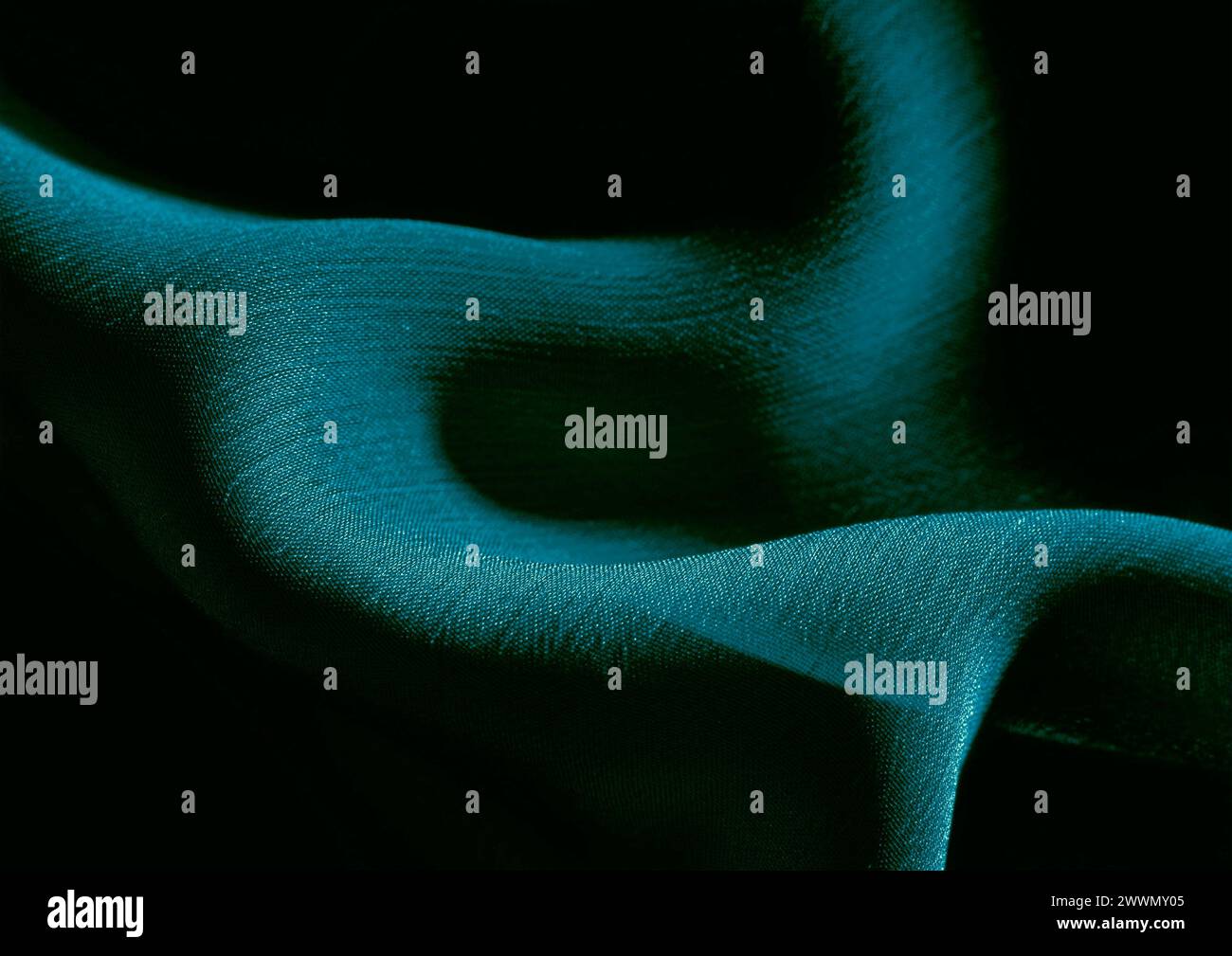 Vista ravvicinata con motivo in tessuto verde, sfondo del materiale tessile Foto Stock