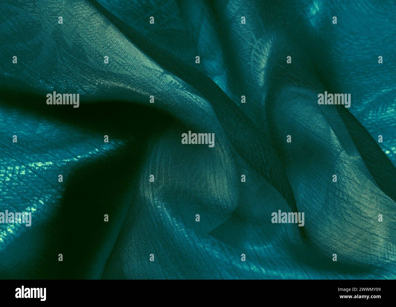Vista ravvicinata con motivo in tessuto verde, sfondo del materiale tessile Foto Stock