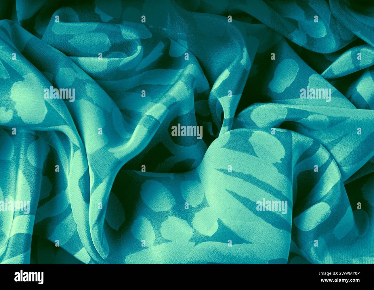 Vista ravvicinata con motivo in tessuto verde, sfondo del materiale tessile Foto Stock