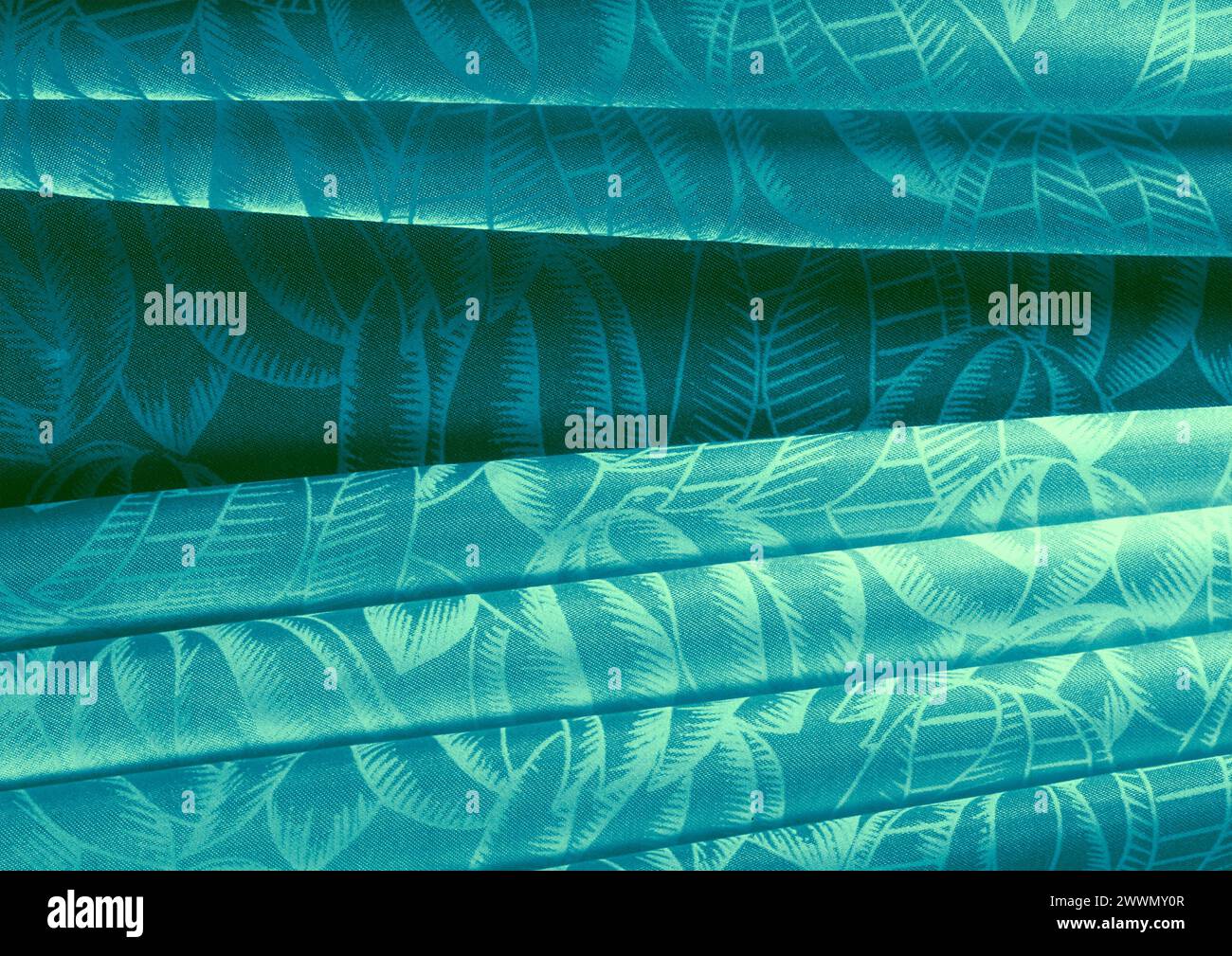 Vista ravvicinata con motivo in tessuto verde, sfondo del materiale tessile Foto Stock