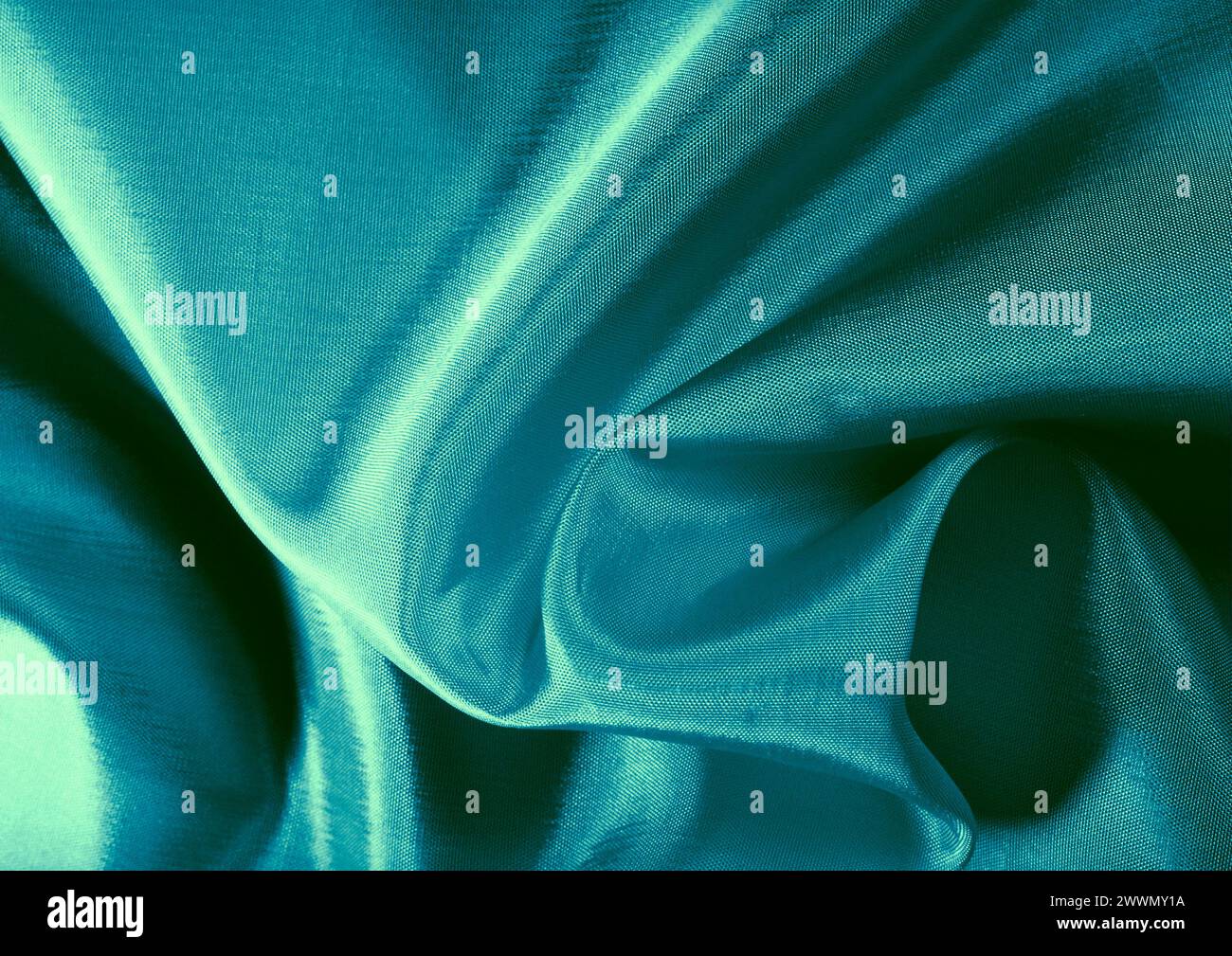 Vista ravvicinata con motivo in tessuto verde, sfondo del materiale tessile Foto Stock