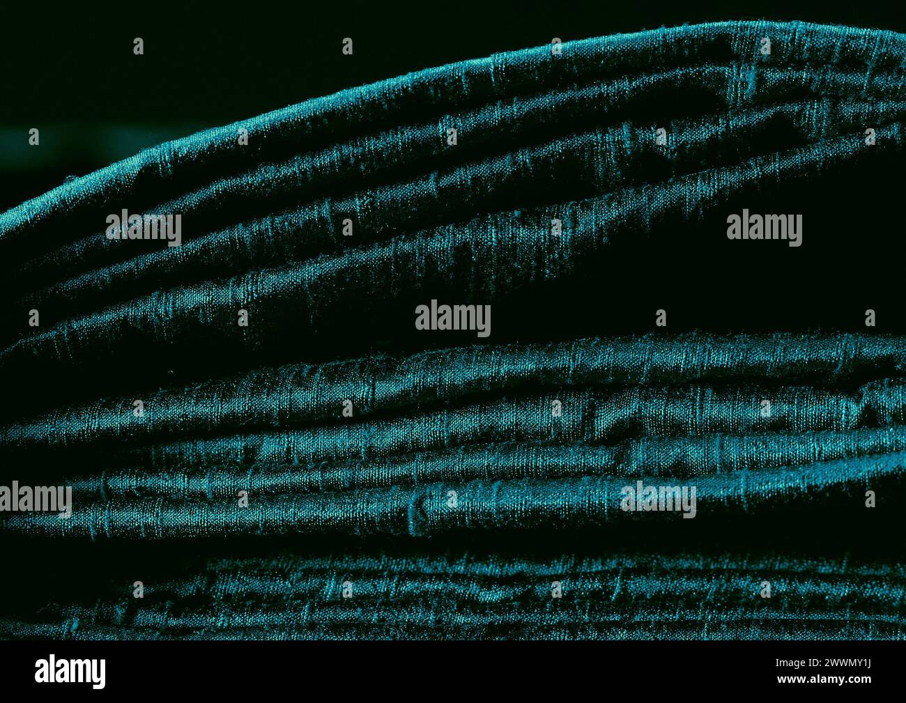 Vista ravvicinata con motivo in tessuto verde, sfondo del materiale tessile Foto Stock