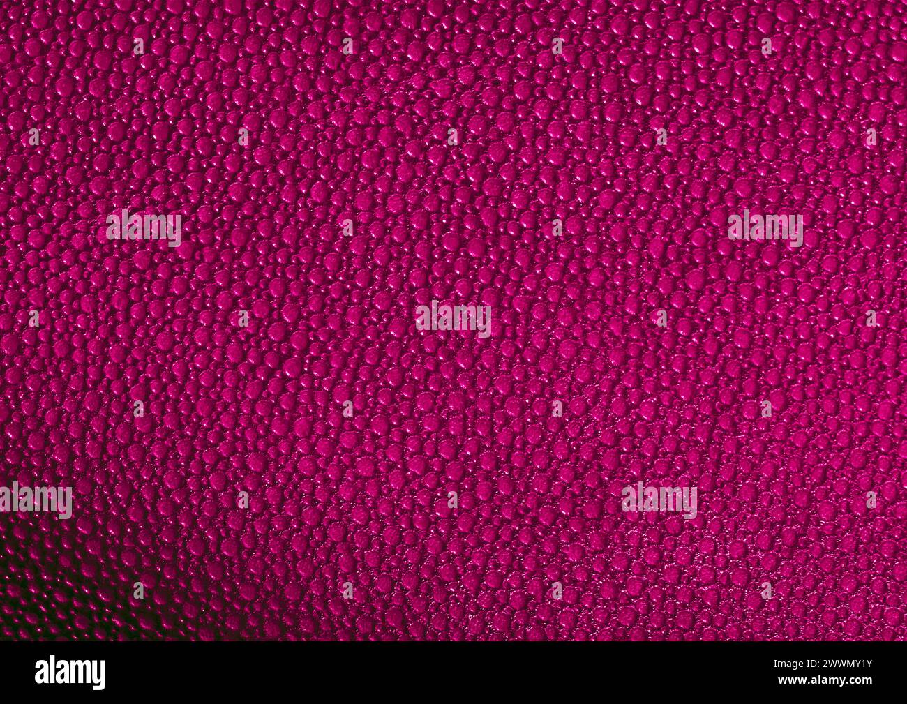 Vista ravvicinata con motivo in tessuto rosso, sfondo del materiale tessile Foto Stock