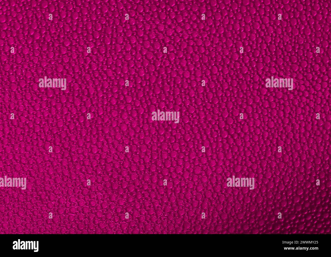 Vista ravvicinata con motivo in tessuto rosso, sfondo del materiale tessile Foto Stock