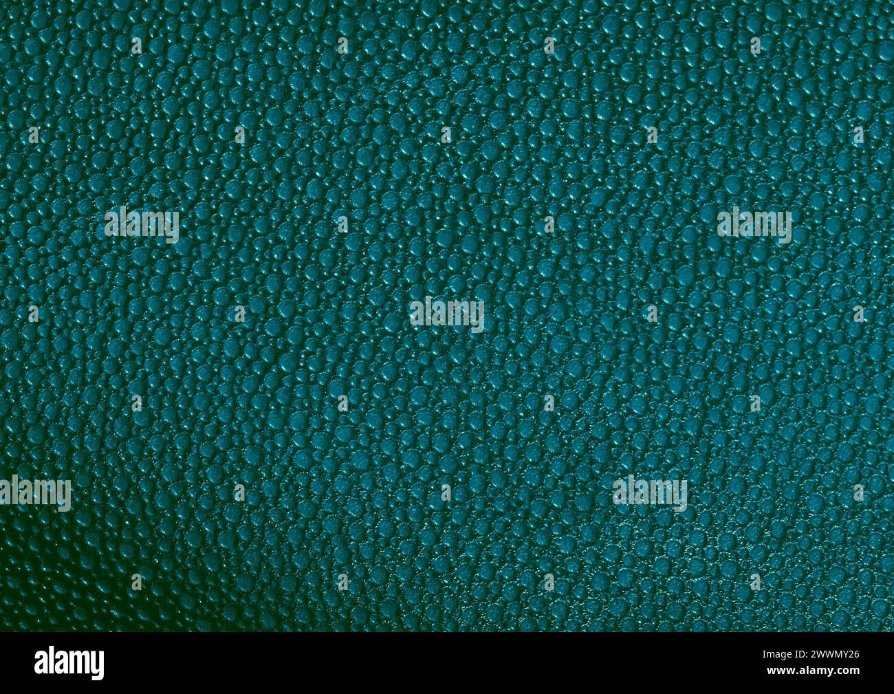 Vista ravvicinata con motivo in tessuto verde, sfondo del materiale tessile Foto Stock