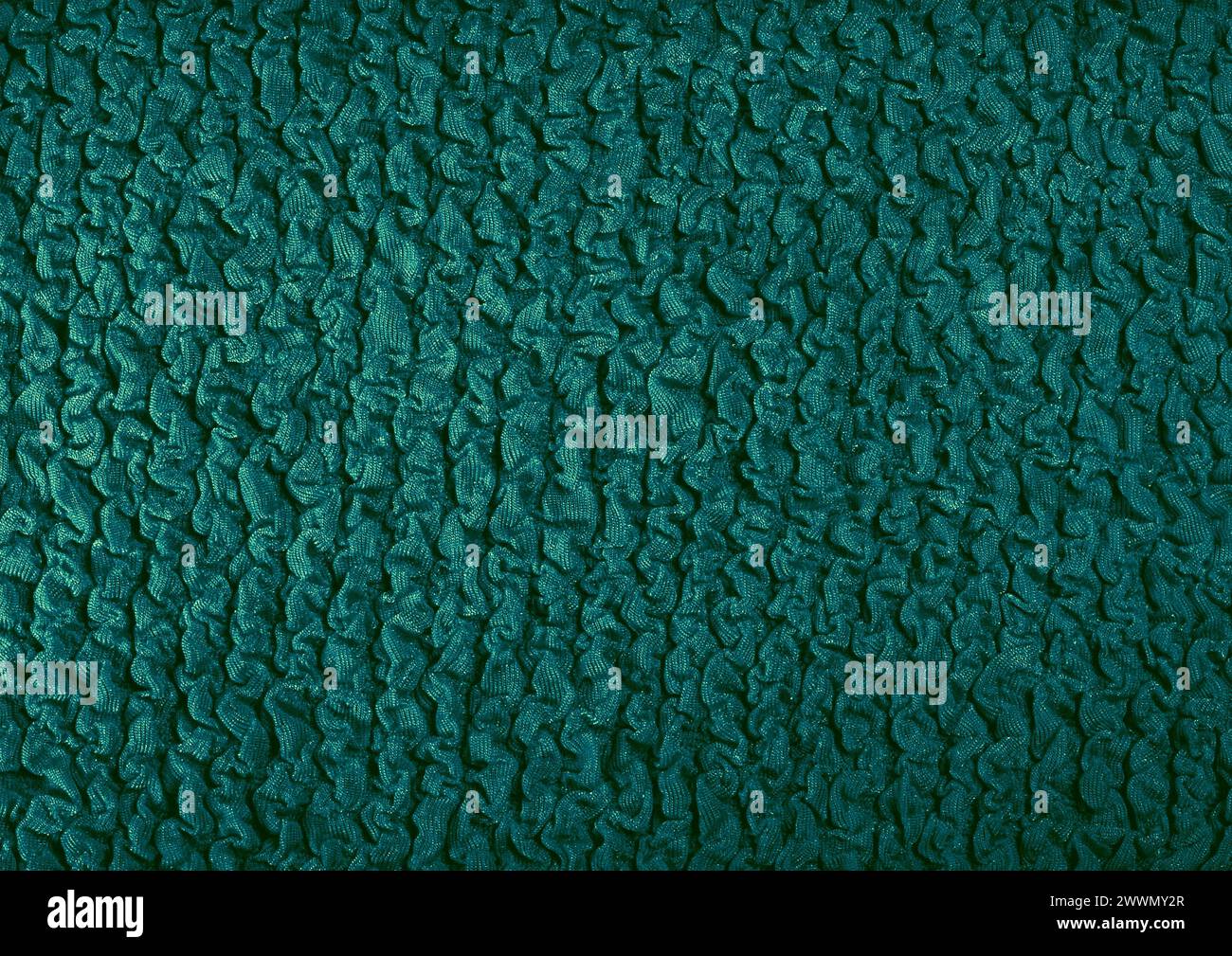 Vista ravvicinata con motivo in tessuto verde, sfondo del materiale tessile Foto Stock