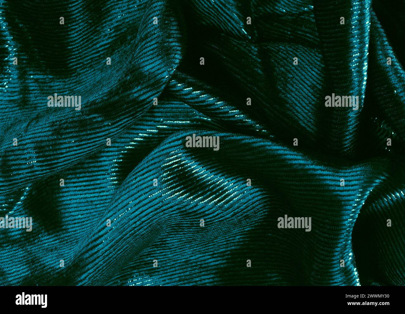 Vista ravvicinata con motivo in tessuto verde, sfondo del materiale tessile Foto Stock