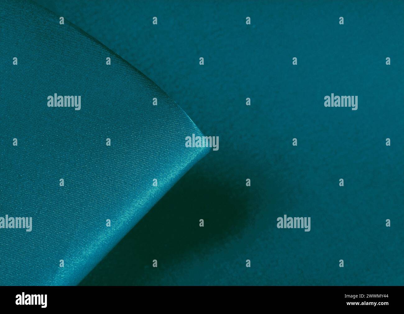 Vista ravvicinata con motivo in tessuto verde, sfondo del materiale tessile Foto Stock