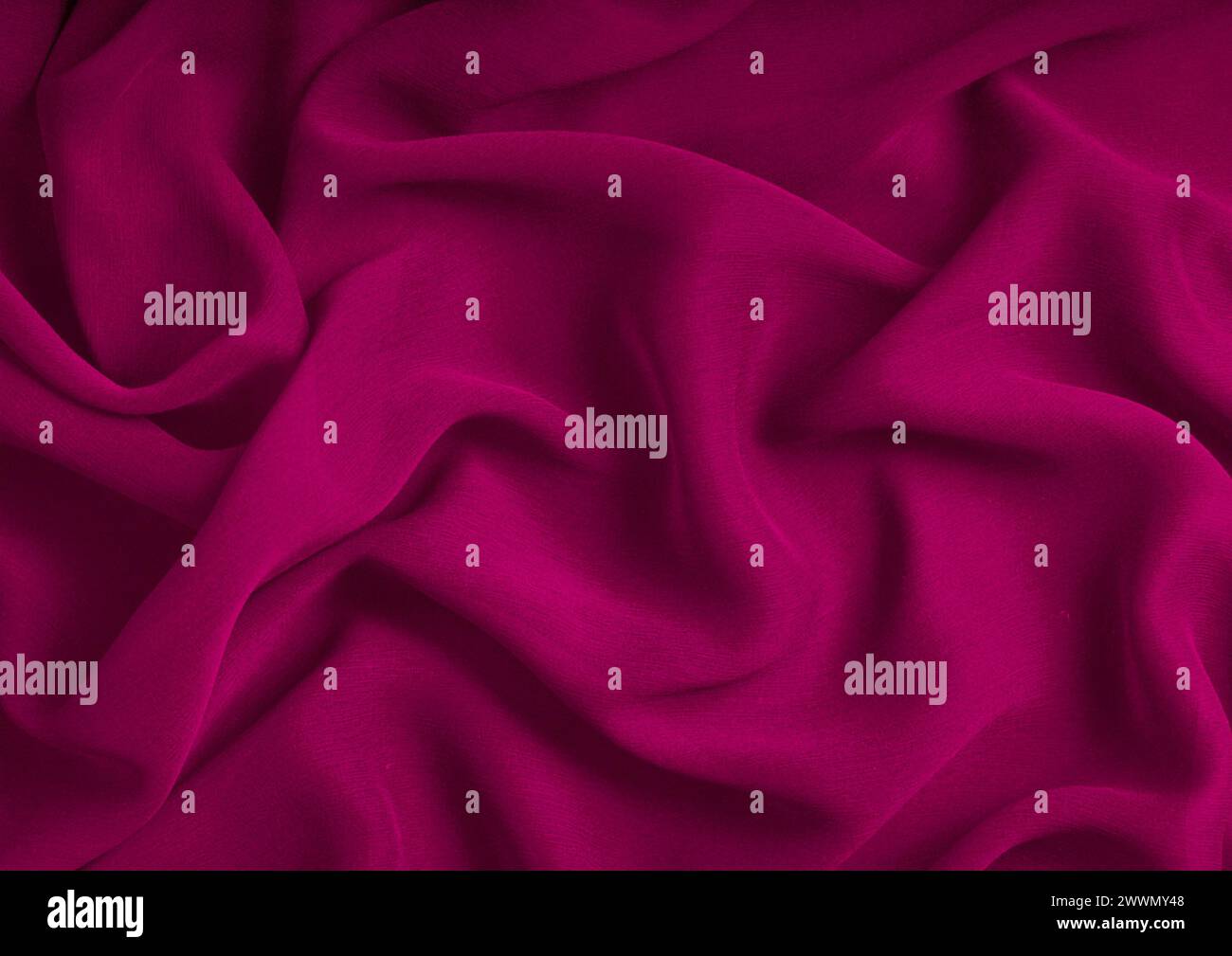 Vista ravvicinata con motivo in tessuto rosso, sfondo del materiale tessile Foto Stock