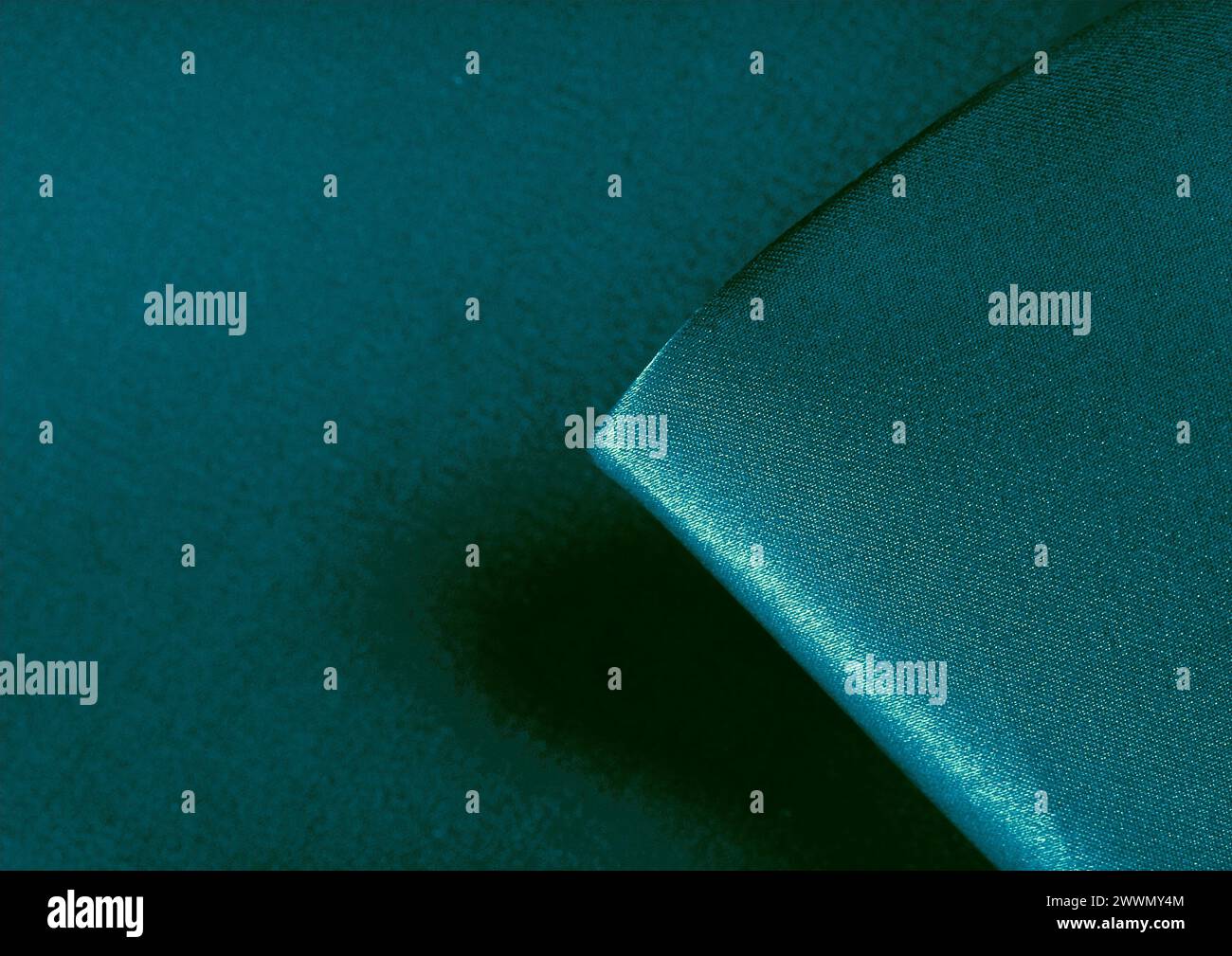 Vista ravvicinata con motivo in tessuto verde, sfondo del materiale tessile Foto Stock