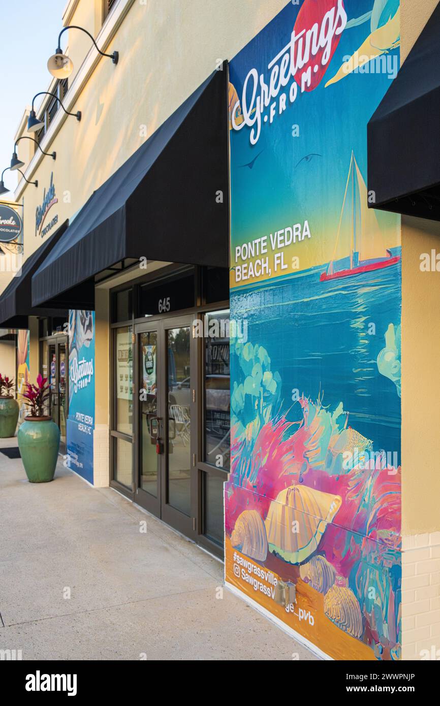 "Saluti da Ponte Vedra Beach, Florida" murales dipinti al centro commerciale Sawgrass Village di Ponte Vedra Beach, Florida. (USA) Foto Stock