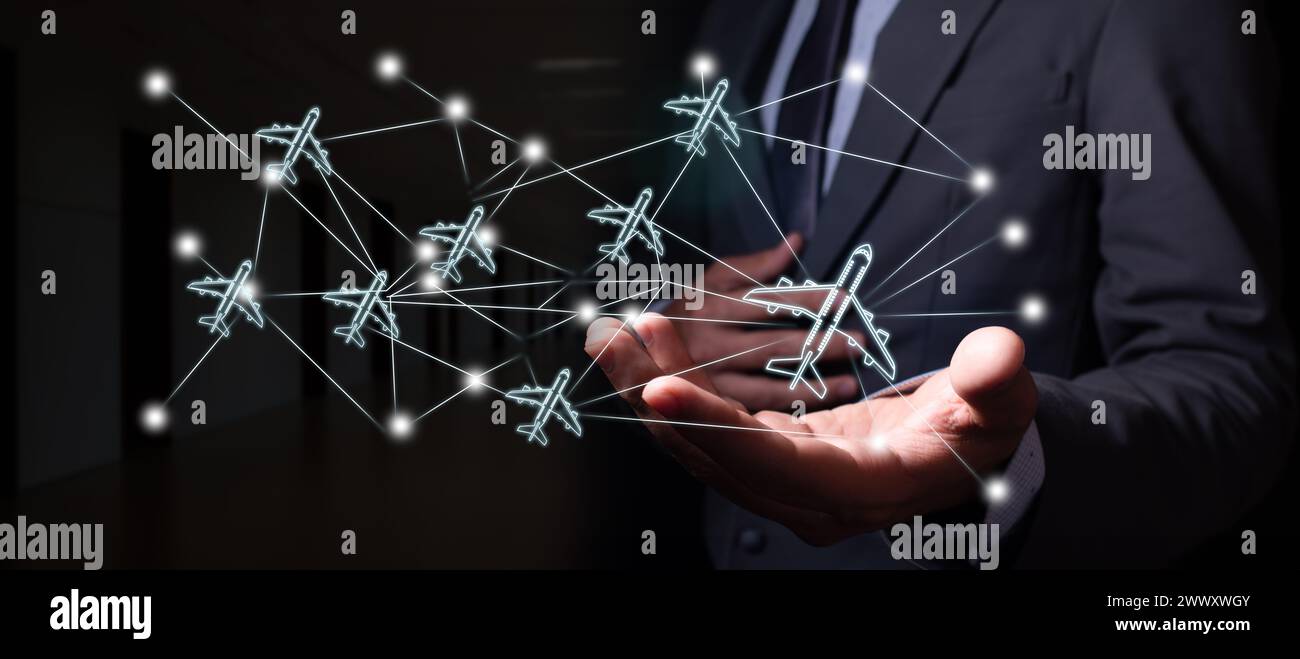 Executive analizza una rete digitale globale per lo scambio di dati nel settore aerospaziale. Foto Stock