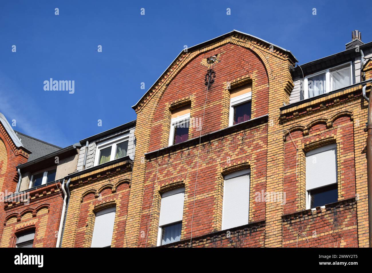 vecchia casa di mattoni Foto Stock