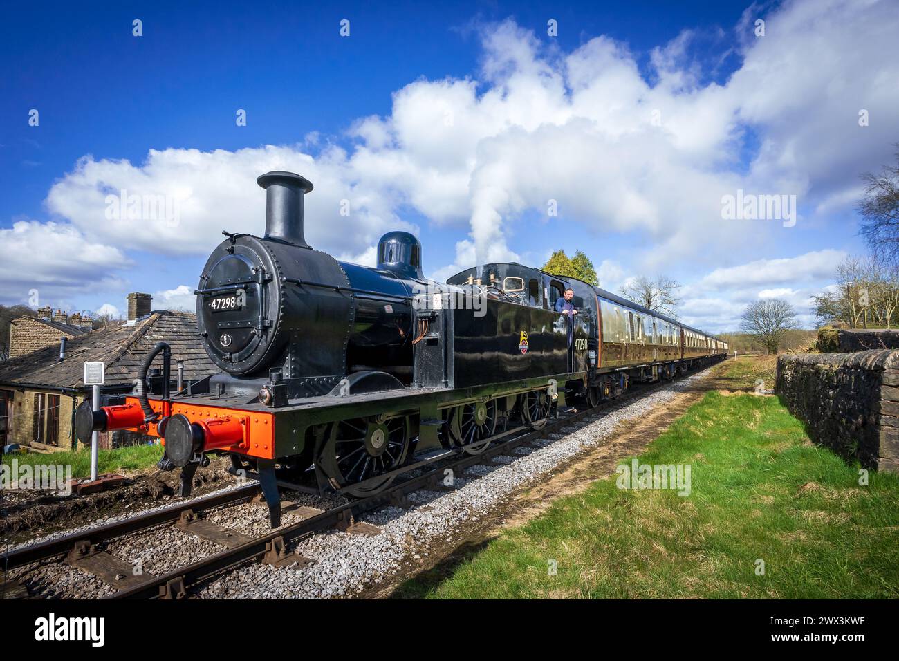 Jinty numero 47208, in avvicinamento alla stazione di Irwell vale sulla ferrovia del Lancashire orientale. Foto Stock