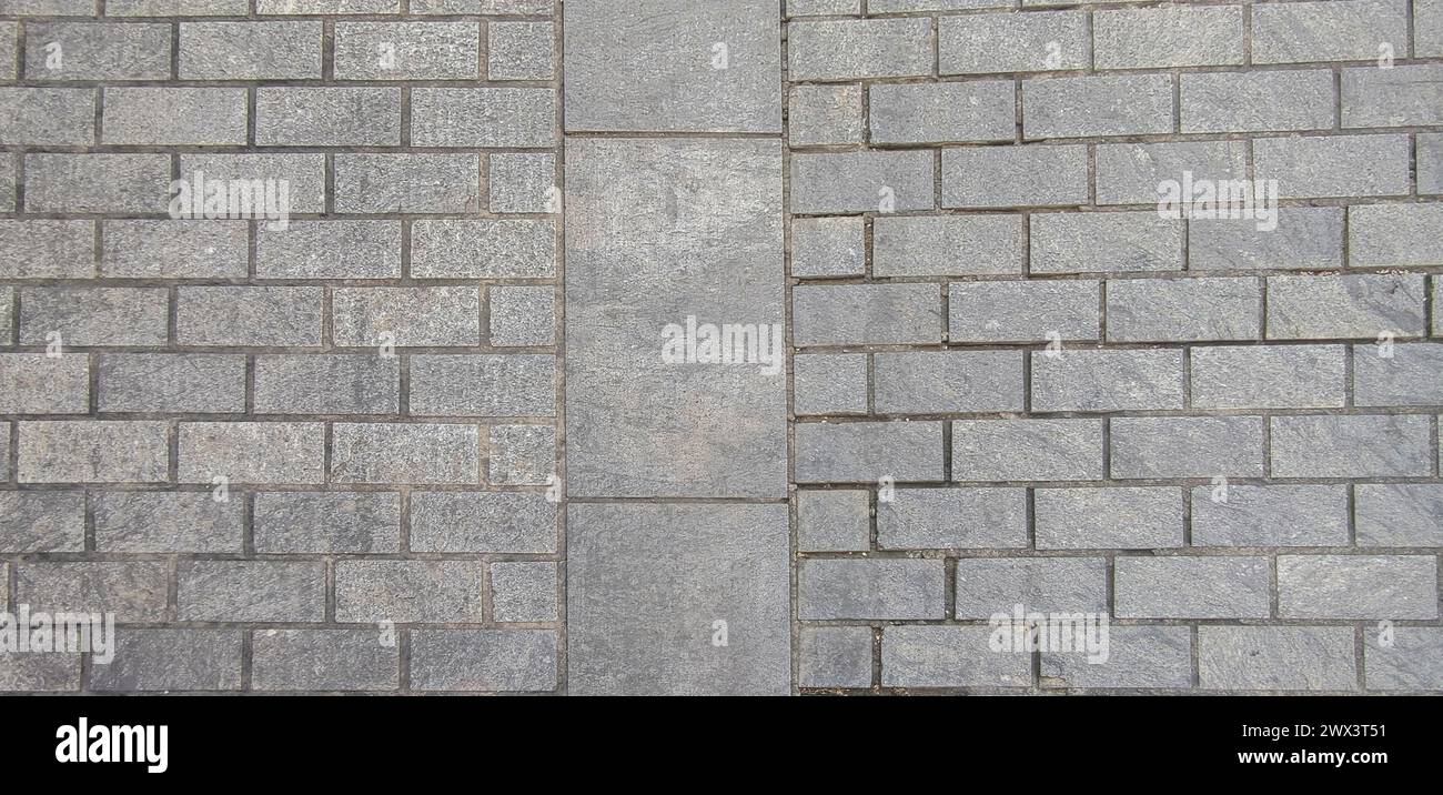 Pavimentazione con blocchi di granito tagliati. Superficie stradale del complesso monumentale, Caceres, Spagna Foto Stock