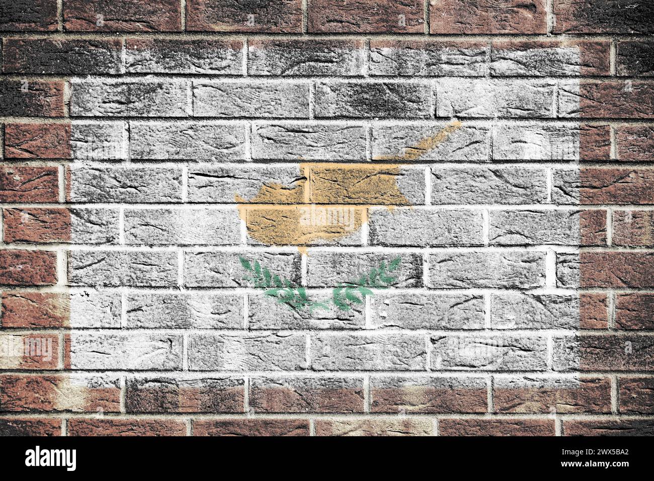 Una bandiera di Cipro dipinta su sfondo murato di mattoni, ramo d'oliva in oro bianco Foto Stock