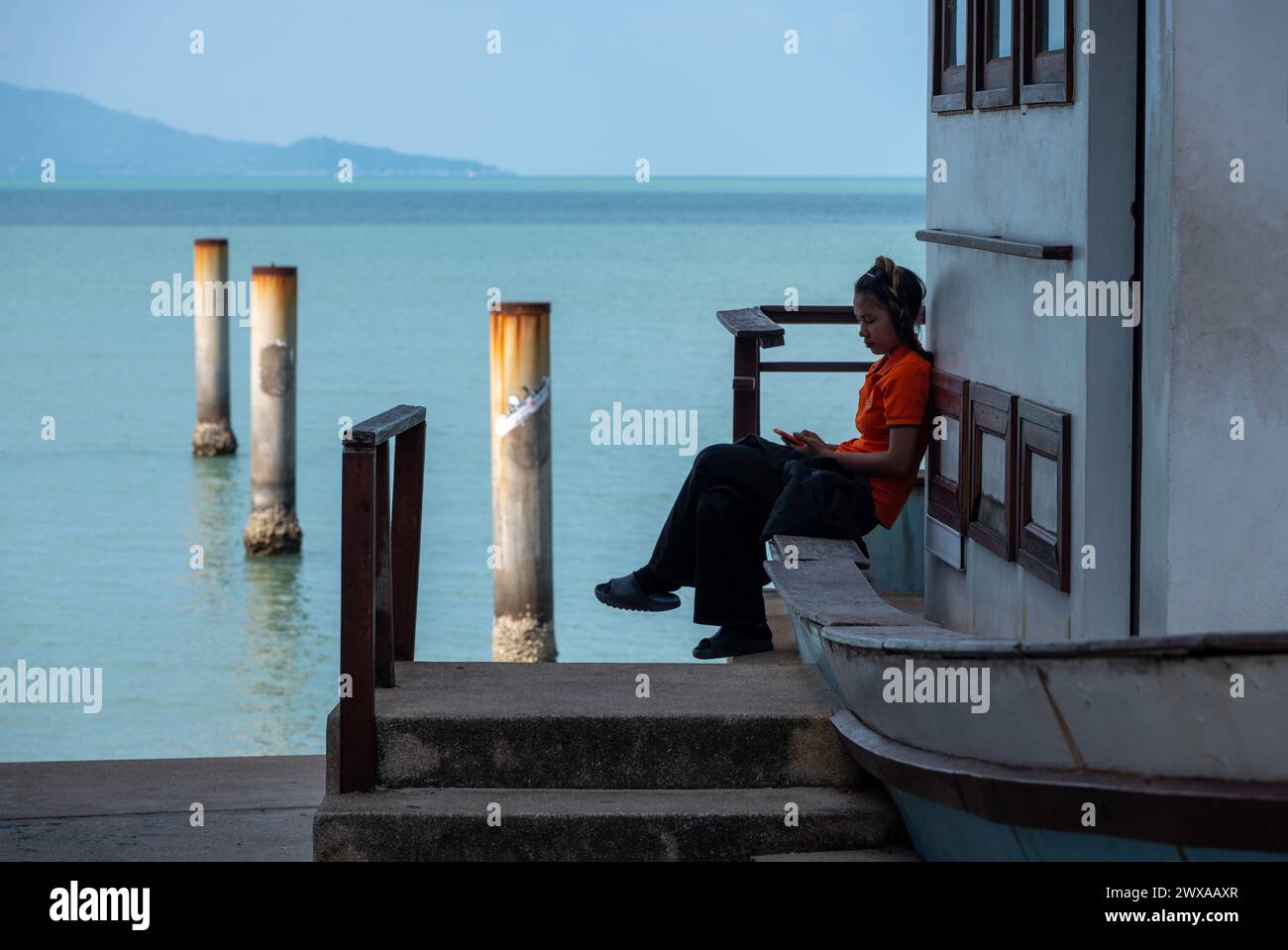 Donna tailandese in pausa Foto Stock