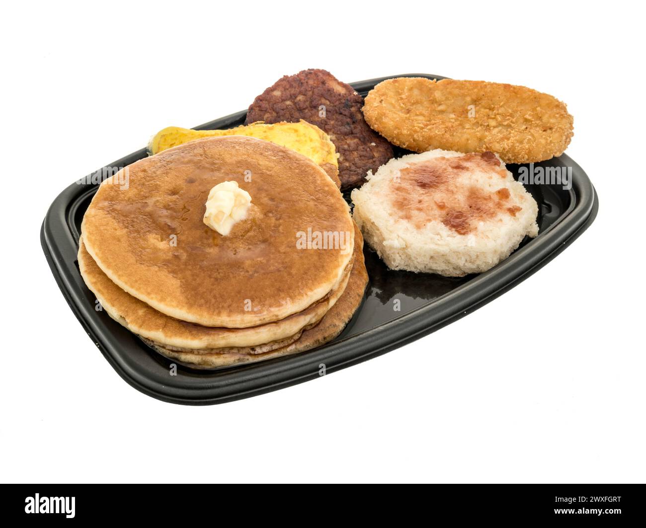 Winneconne, WISCONSIN - 30 marzo 2024: Un pacchetto di colazione McDonalds Big con torte, biscotti, hash Brown, salsiccia, colazione con uova strapazzate su un isolato Foto Stock